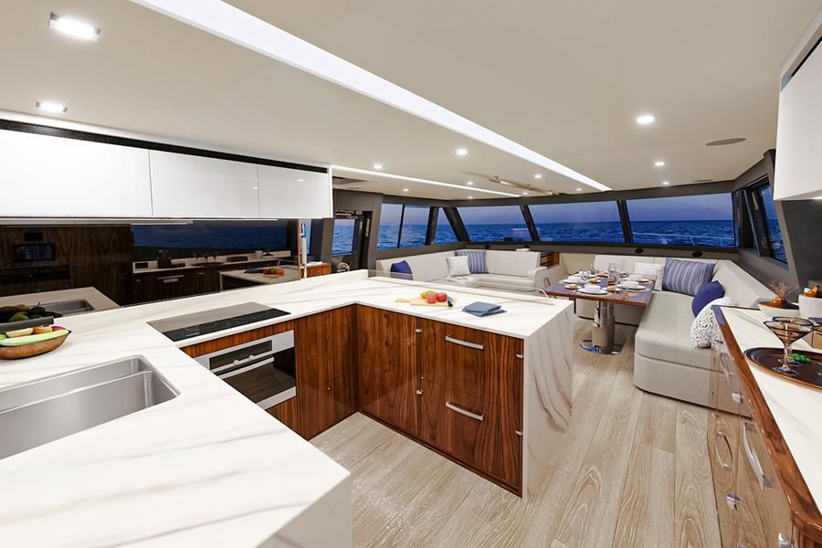 The U-shaped aft galley of the 72 Series II is an inspiring space, superbly equipped with premium appliances beautifully integrated into handcrafted timber joinery
