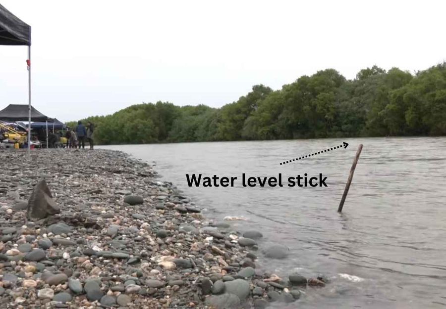 The stick placed in the Mataura River to determine the rise in river level. Credit: River Racing NZ - New Zealand Jet Boat River Racing Association