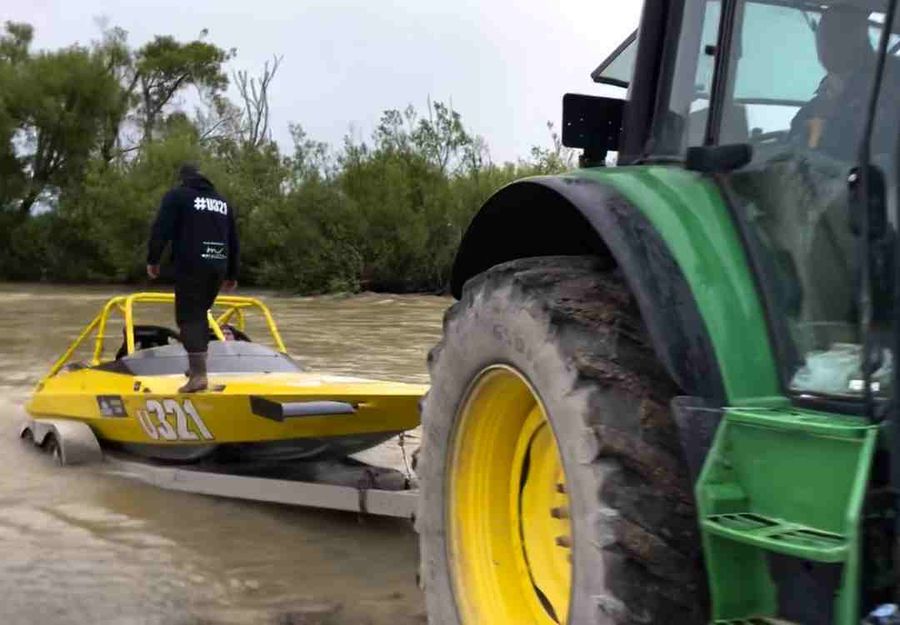 This is how some of the boats are being put in due to the very soft river's edge. Image credit: River Racing NZ - New Zealand Jet Boat River Racing Association