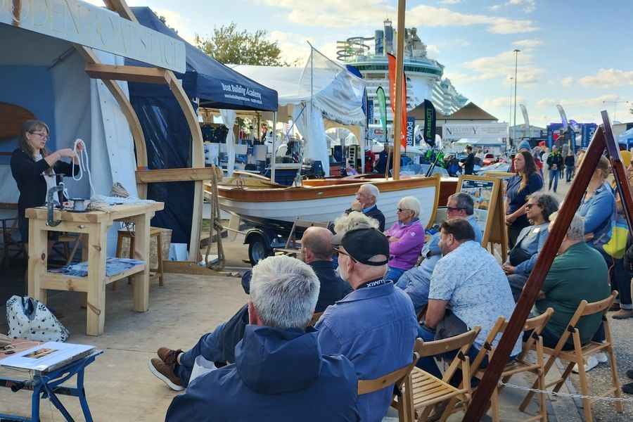 Visitors watching a demonstration at the Wooden Boat Stage