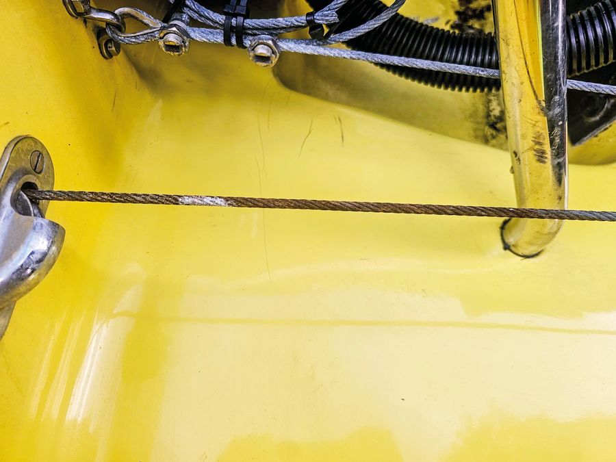 Wire rope steering cable is largely hidden inside the hull, it_s important to inspect every inch of the cable for wear and corrosion
