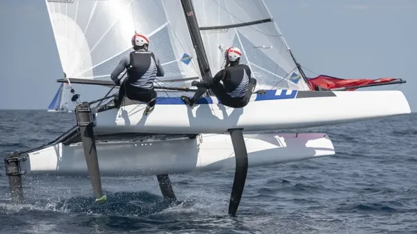 Micah Wilkinson and Kate Stewart are still on course to qualify for the Nacra 17 medal series.