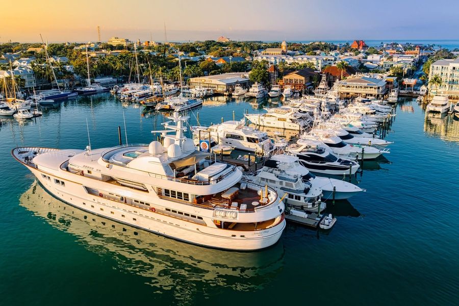Aerial view of A&B Marina and Key West Historic Seaport at sunrise, with yachts filling the harbour