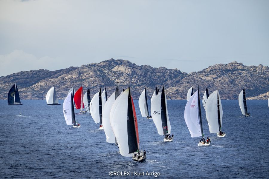 Fleet action at the Rolex Swan Cup, with Swans racing hard off Porto Cervo. Rolex | Kurt Arrigo