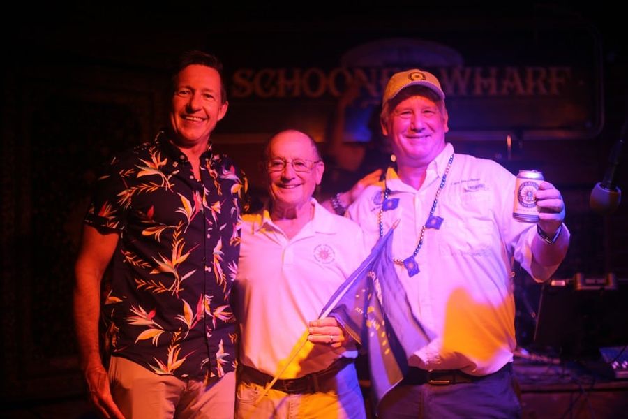 Mayor Emeritus Dennis Wardlow (centre) and Secretary of State Captain James R. Gilleran (right) mark the declaration at Schooner Wharf Bar on 3 October 2026.