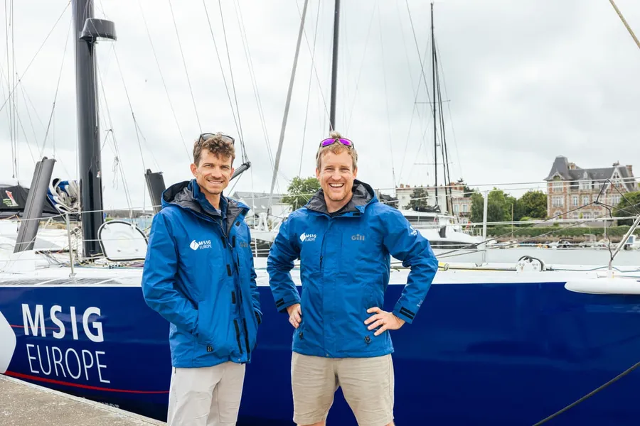 conrad-et-mathieu-devant-l-imoca-msig-credit-georgia-schofield-1800x.webp