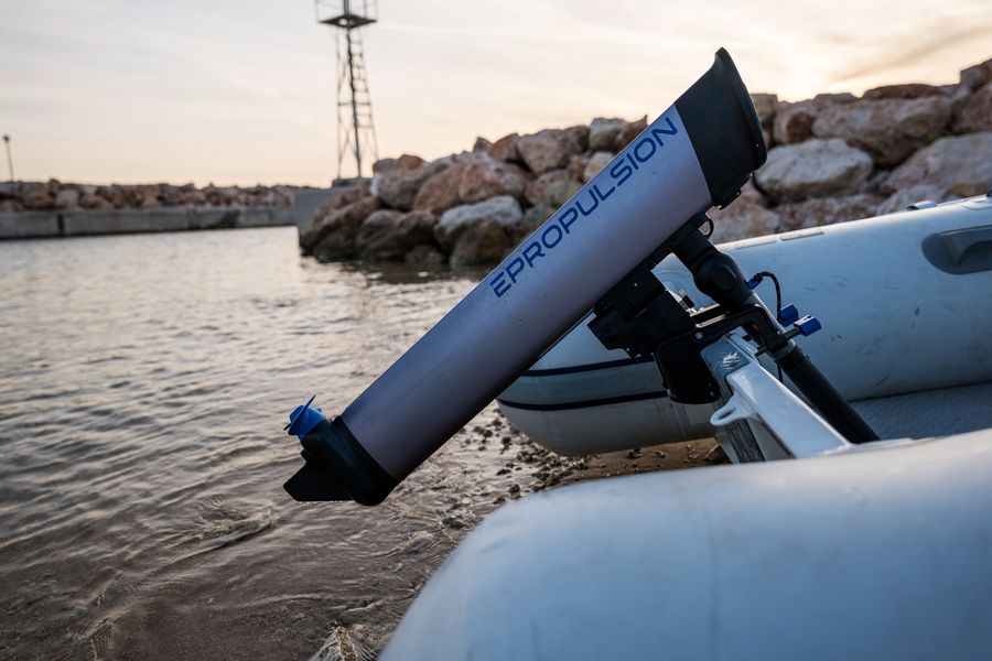Visitors check out the eLite electric outboard's features at Southampton