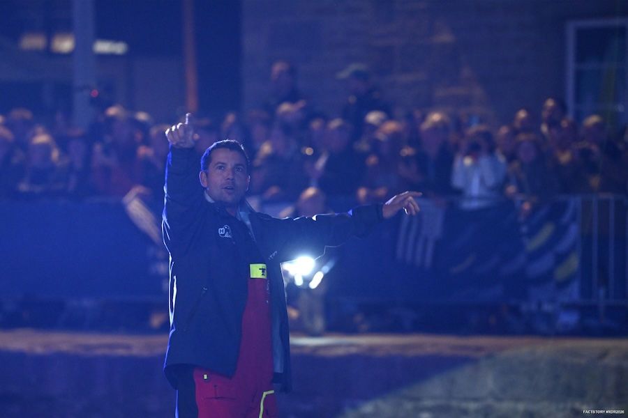 Guirec Soudée steers Liamm into the lock, drawing cheers from the crowd (Vincent Curutchet / Route du Rhum 2026 / FACTSTORY)
