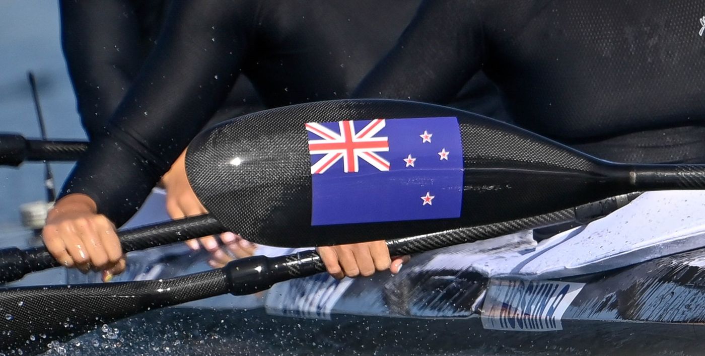 flag-on-paddle-scaled-1.jpg