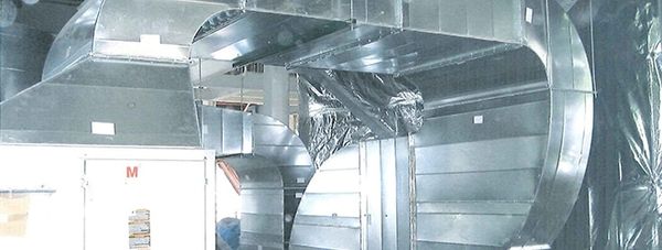 A Hock Incorporated crew carries out commercial HVAC ductwork installation.
