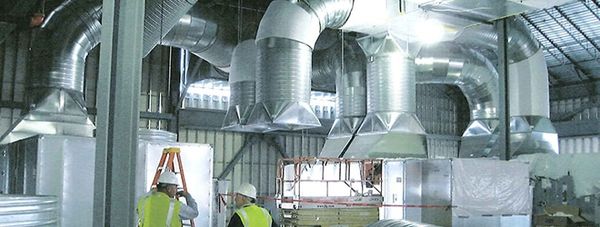 The Hock Incorporated crew installs spiral duct on site.