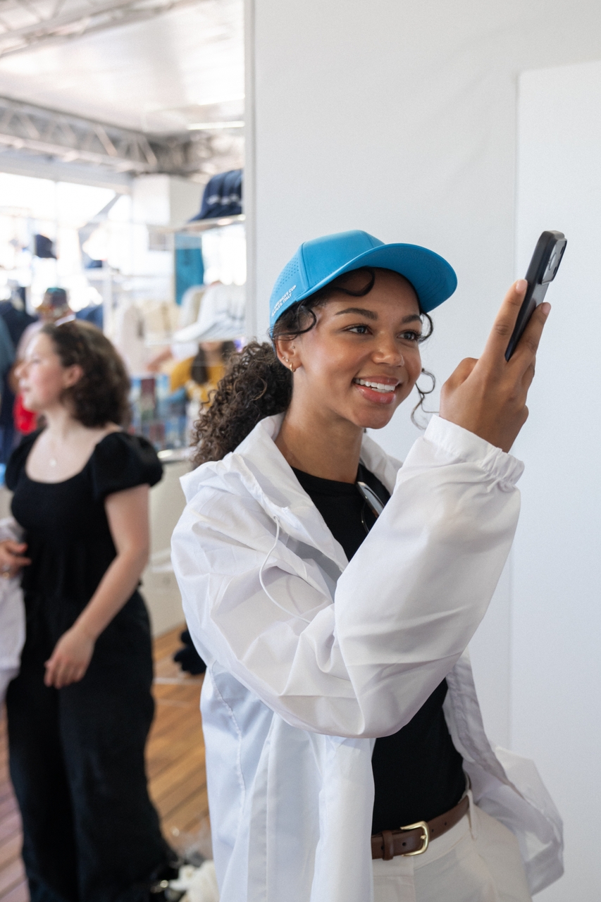 Influencer Emily Wilcox visits the Official Store in the Race Village at the Louis Vuitton 38th America's Cup Preliminary Regatta Sardinia, 23 May 2026.