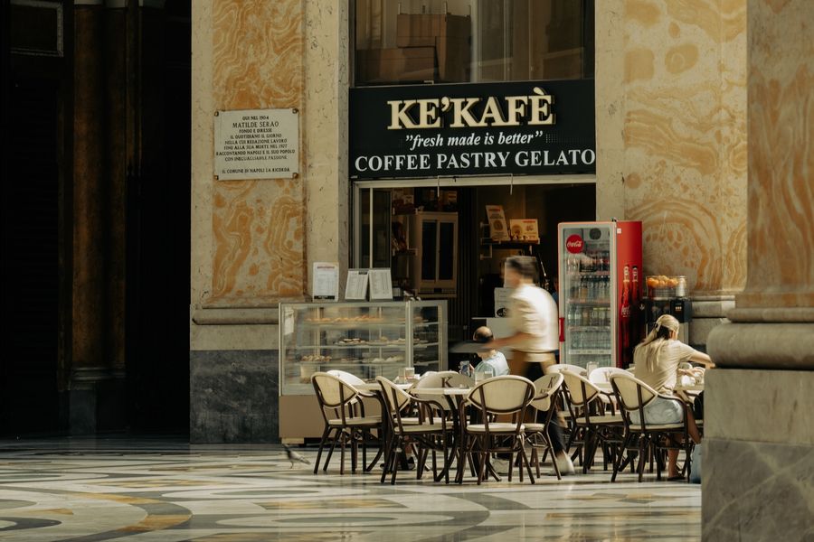 Naples' streets and harbour buzz with anticipation as America's Cup preparations continue.