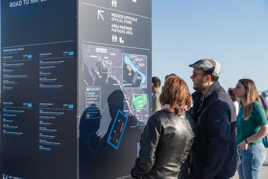 Crowds gather at the Race Village during the Louis Vuitton 38th America's Cup Preliminary Regatta in Sardinia, 22 May 2026.
