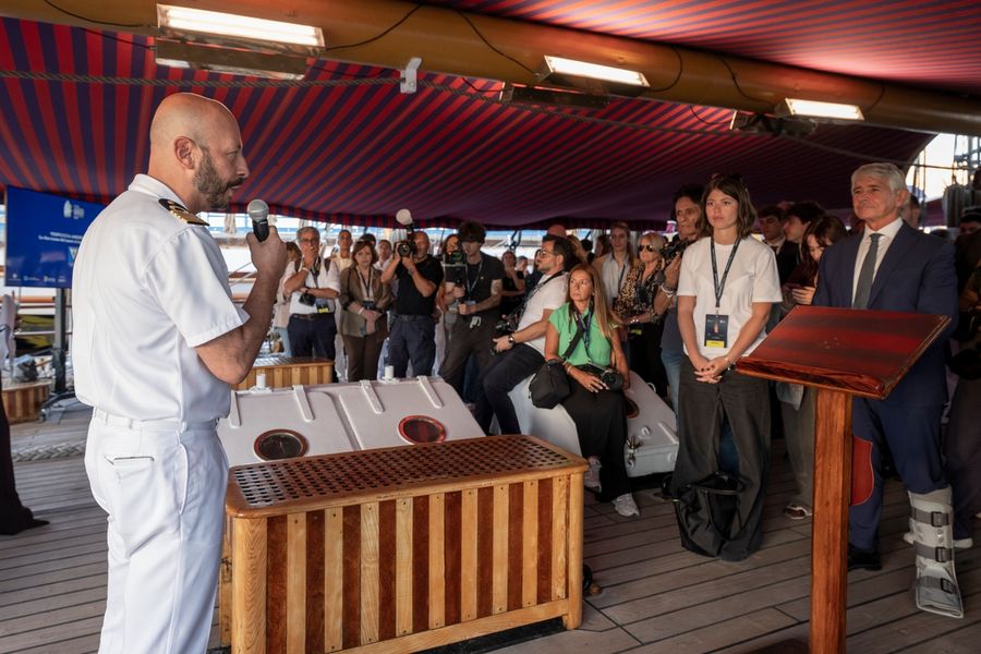 Crews take in the Amerigo Vespucci while visiting Naples for the Louis Vuitton 38th America's Cup preliminary regatta.