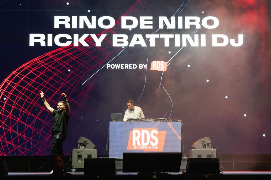 RDS Radio hosts Rino De Niro and Ricky Battini DJ entertain the crowd on stage at the Naples Preliminary Regatta.