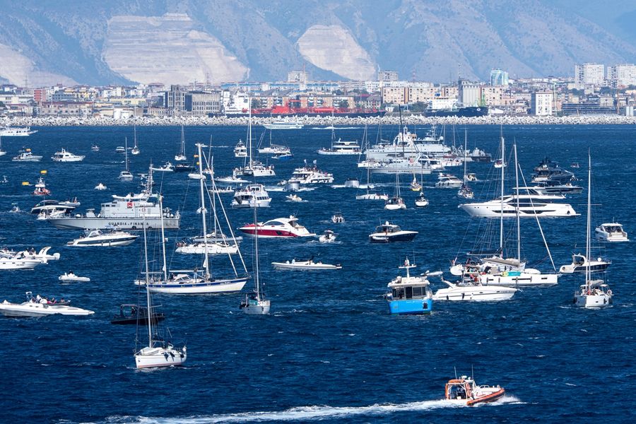 Spectator boats pack the water during Race Day 2 of the Louis Vuitton 38th America's Cup Preliminary Regatta in Naples, 26 September 2026. Photo: Ian Roman/America's Cup
