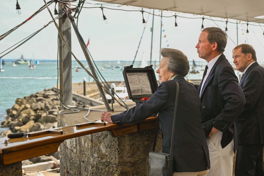 Princess Anne fires the cannon to officially open Cowes Week on Sunday morning.