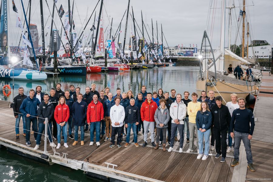 All skippers but Boris Herrmann are posing for the official group picture on pontoons of the Vendee Globe, on October 20, 2024 in Les Sables d'Olonne, France. Photo Credit: Vincent Curutchet Vendee Media