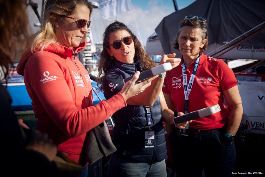 Noé Poffa, Ifremer, and CNES representatives are pictured with Initiatives-Coeur skipper Sam Davies(GBR) while distributing scientific tools in coordination with UNESCO, to skippers before start of the Vendee Globe, on October 22, 2024 in Les Sables d'Olonne, France - (Photo by Anne Beauge / Alea)