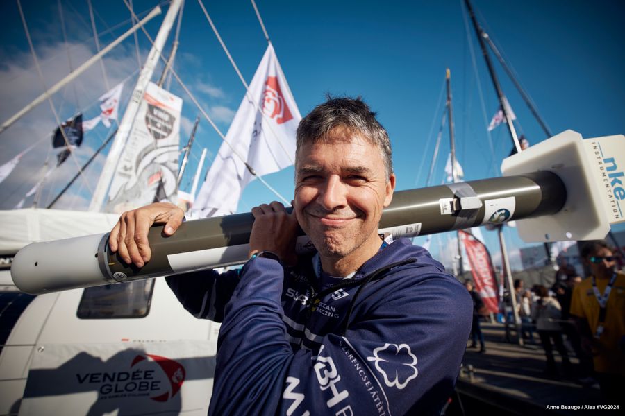 OCTOBER 22, 2024: Noé Poffa, Ifremer, is pictured with New Europe skipper Szabolcs Weöres (HUN) while distributing scientific tools in coordination with UNESCO, before start of the Vendee Globe, on October 22, 2024 in Les Sables d'Olonne, France - (Photo by Anne Beauge / Alea)