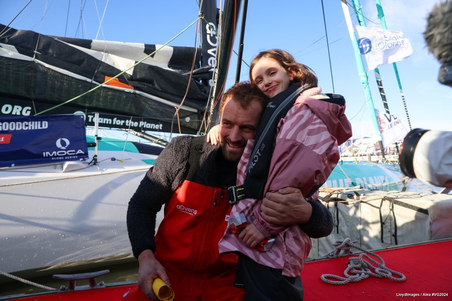 VULNERABLE skipper Sam Goodchild (GBR) is photographed with his daughter after taking 9th place in the Vendee Globe, on January 25, 2025 in Les Sables d'Olonne, France - Photo credit: LloydImages / Alea