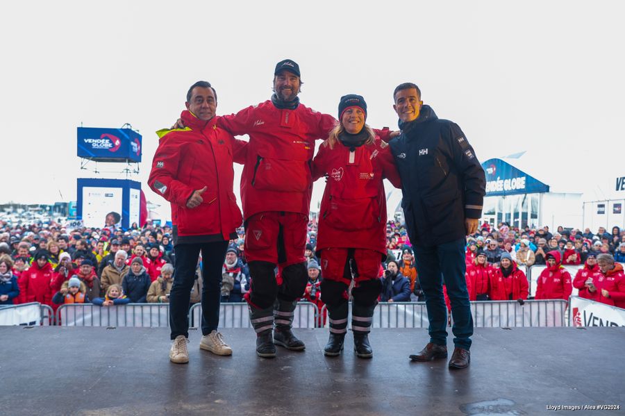Malizia - Seaexplorer skipper Boris Herrmann (GER) and Initiatives-Coeur skipper Sam Davies (GBR) are photographed on stage with Alain Leboeuf (President SAEM Vendee) and Nicolas Chenechaud (Vendée Department) after taking respectively 12th and 13th place in the Vendee Globe, on January 30, 2025 in Les Sables d'Olonne, France - Photo credit: Lloyd Images / Alea